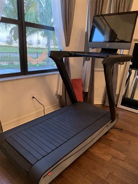 Ceiling height minimum: 20" greater than the user's height. . Peloton treadmill for sale
